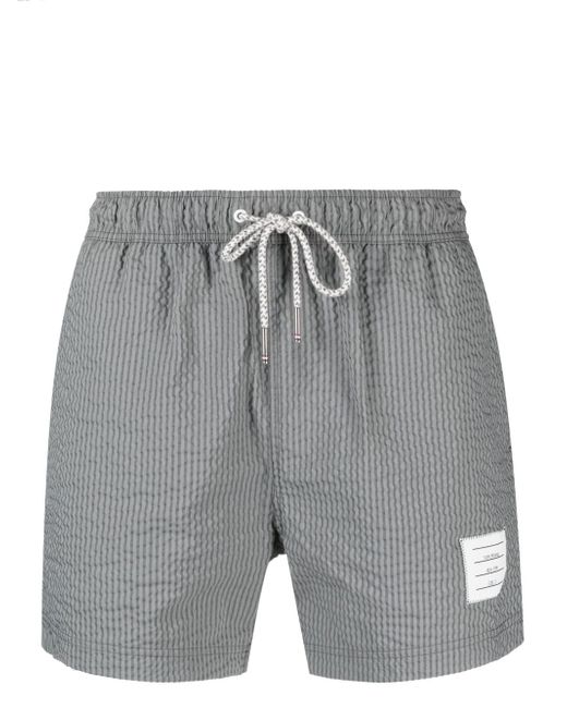 Thom Browne striped seersucker-texture swim shorts