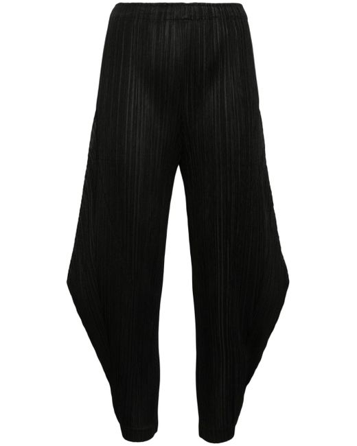 Pleats Please By Issey Miyake tapered pleated trousers