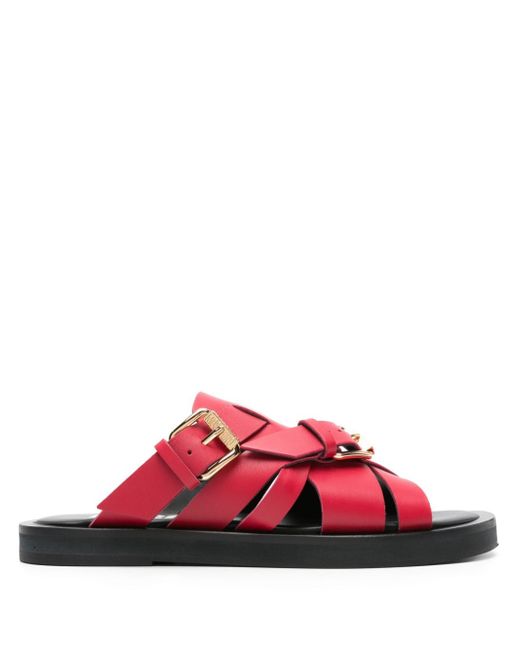 Moschino buckled leather slides