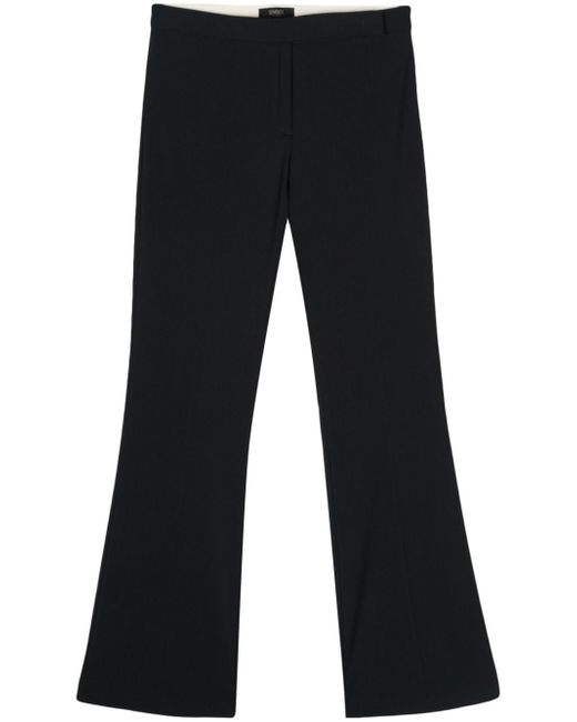 Seventy pressed-crease flared trousers