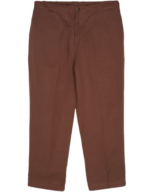Costumein pressed-crease tapered trousers