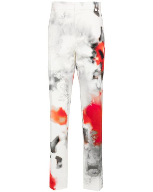Alexander McQueen blotch-print slim-fit trousers