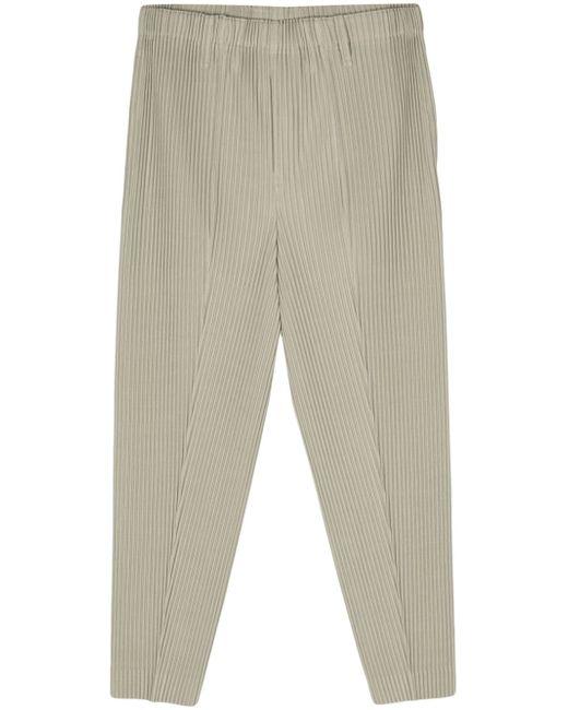 Homme Pliss Issey Miyake Compleat tapered-leg trousers