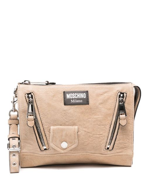 Moschino logo-appliqué leather clutch bag