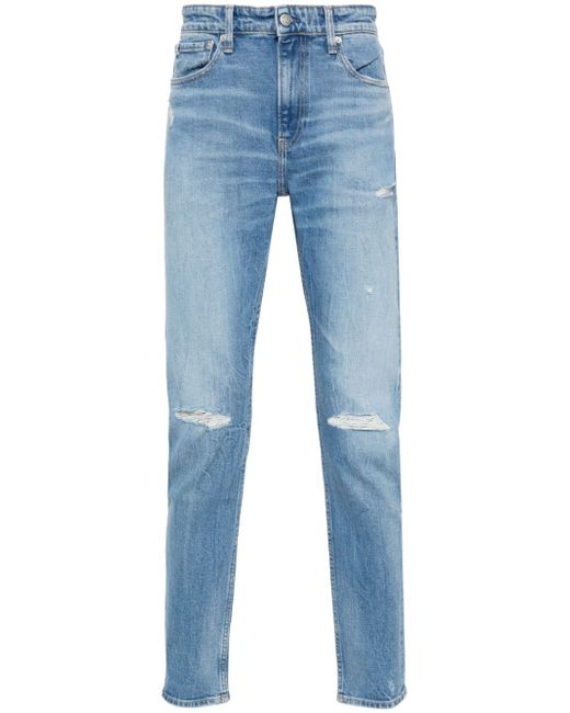 Calvin Klein Jeans distressed tapered-leg jeans