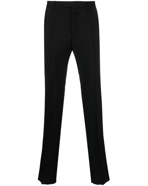 Gucci logo-patch tailored trousers