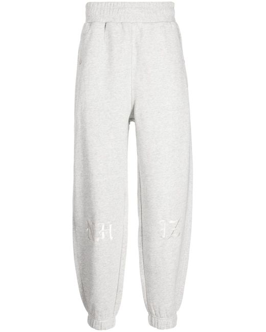 Izzue high-waisted logo-patch tapered track pants