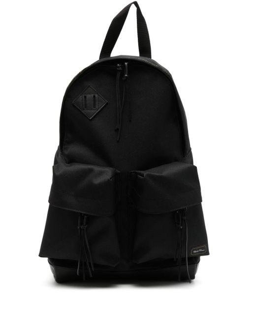Undercover zip-pocket twill backpack