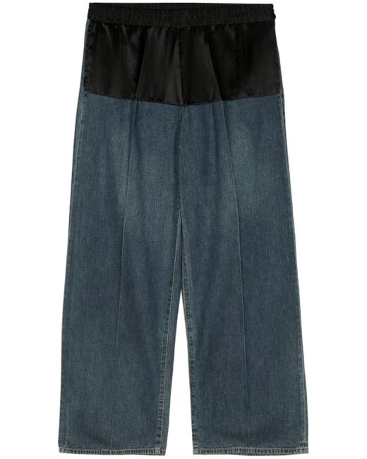 Undercover mid-rise wide-leg jeans