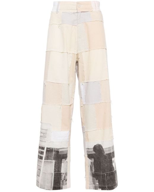 KidSuper graphic-print panelled design trousers