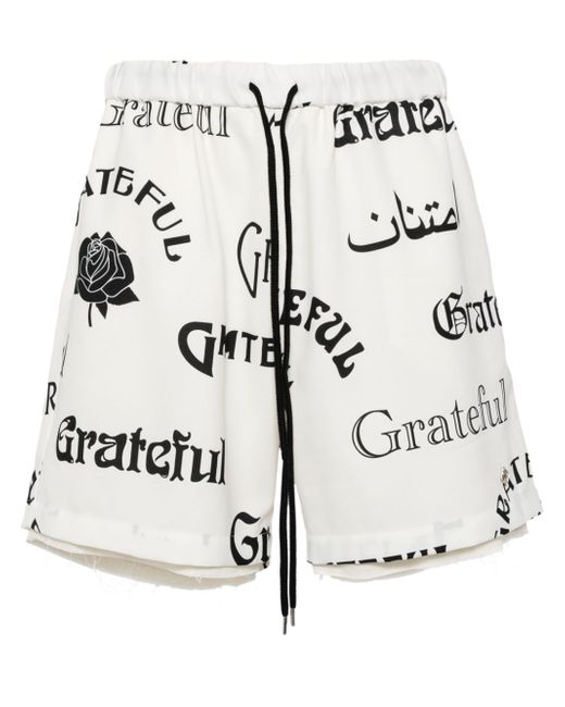 Children of the discordance text-print cotton track shorts