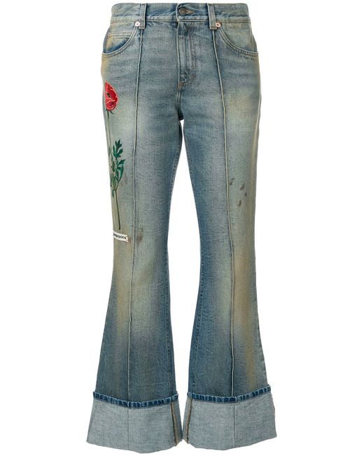 Gucci embroidered flared jeans with turned cuffs