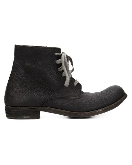 A Diciannoveventitre distressed lace-up boots
