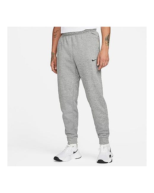Nike Therma-FIT Tapered Sweatpants in Grey/Dark Grey Heather 100 Polyester