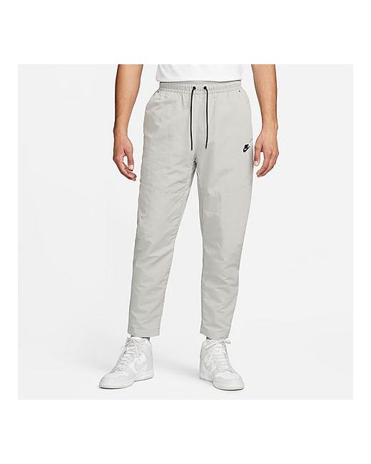 Nike Sportswear Tech Essentials Lined Commuter Pants in Grey/Cobblestone 100 Nylon/Fleece