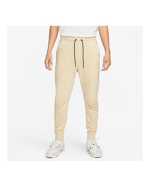 Nike Sportswear Tech Essentials Lightweight Slim-Fit Fleece Jogger Sweatpants in Yellow/Team Gold XS