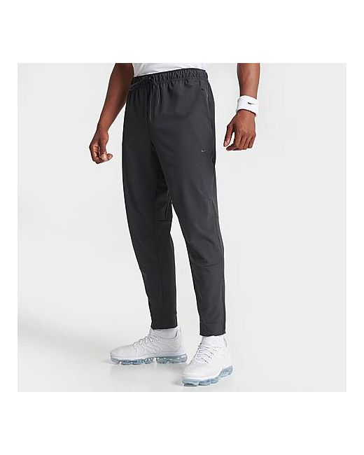 Nike Dri-FIT Unlimited Tapered Leg Versatile Training Pants in Small