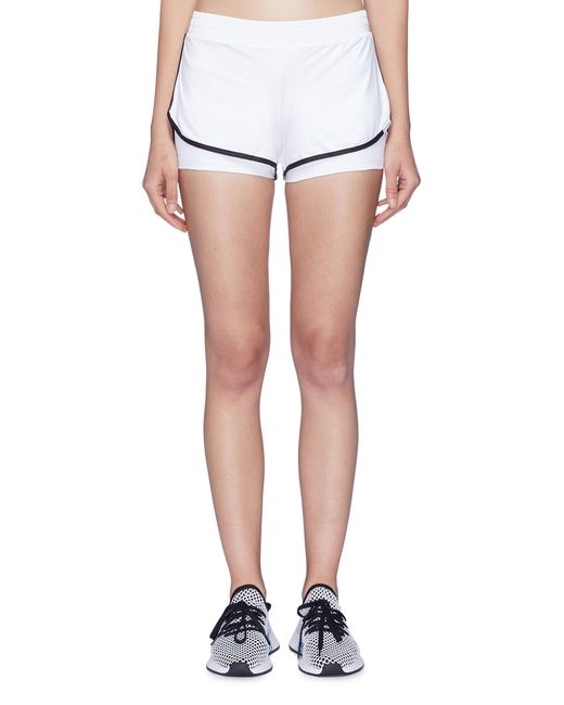 Koral Scout contrast border double layer running shorts