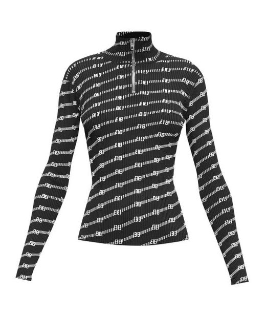 Balenciaga Logo-patterned Quarter-zip Ribbed-knit Top