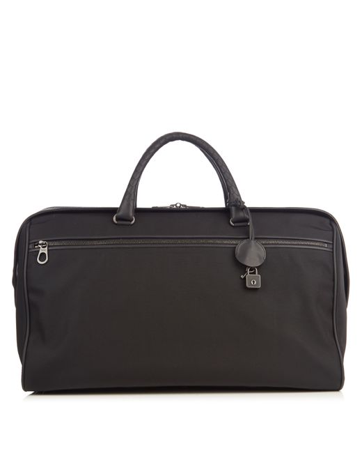 Bottega Veneta Intrecciato leather-trim canvas travel bag