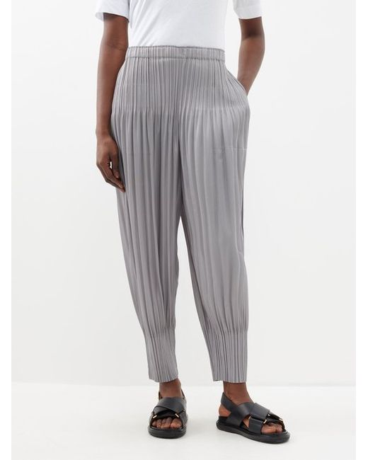 Pleats Please By Issey Miyake Tapered Technical-pleated Trousers
