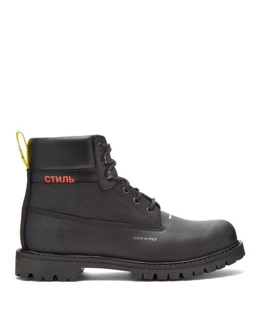 Heron Preston Logo Stamped Lace Up Leather Boots