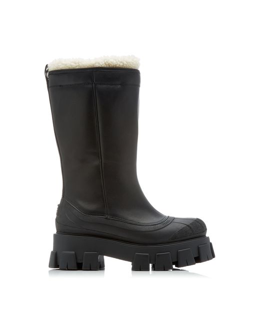 Prada Lug Sole Shearling-Trimmed Leather Boots