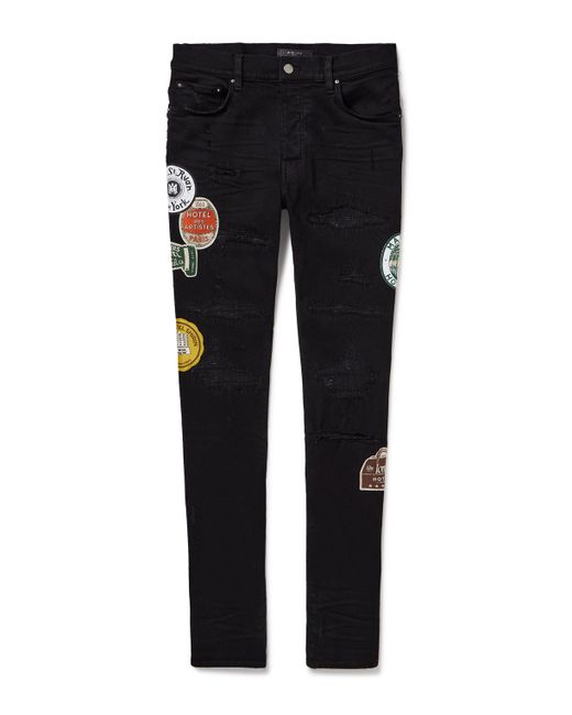 Amiri Skinny-Fit Appliquéd Distressed Jeans UK/US 29