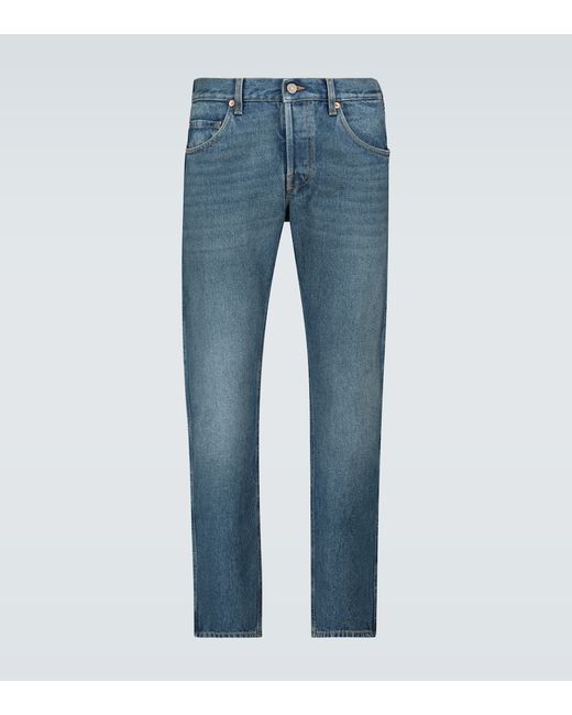 Gucci Washed denim tapered jeans