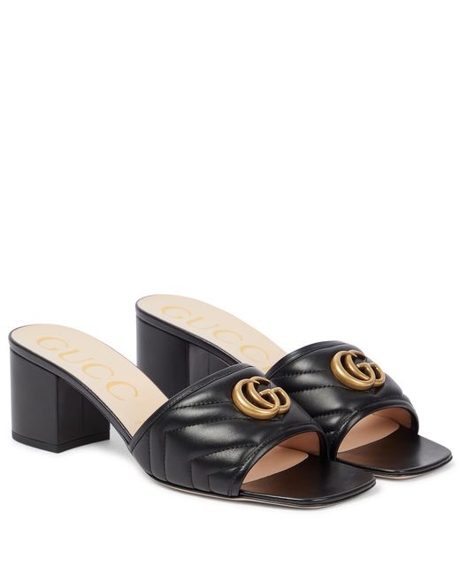 Gucci GG quilted leather mules