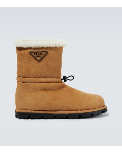 Prada Suede shearling-lined logo boots