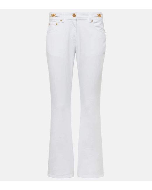 Versace Embellished mid-rise flared jeans