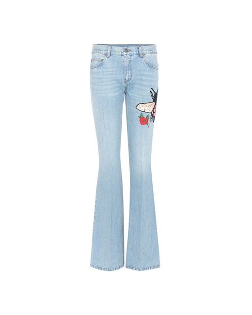 Gucci Flared jeans with embroidered appliqué