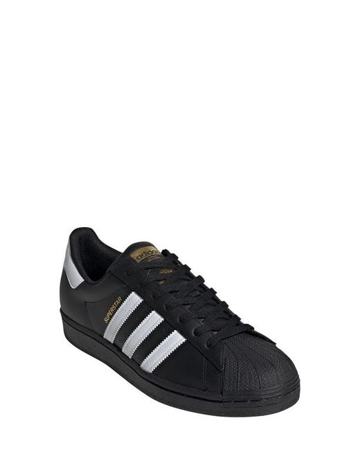 Adidas Superstar Sneaker in Black/Black at