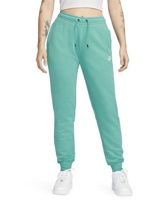 Nike Sportswear Essential Fleece Pants in Washed Teal at