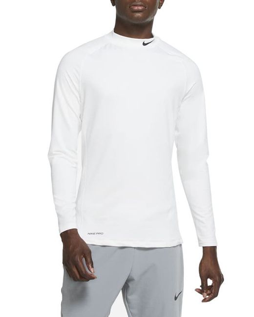 Nike Dri-FIT Pro Warm Long Sleeve Running Shirt in Black at