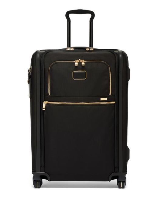 Tumi Short Trip 26-Inch Expandable 4-Wheel Packing Case in Gold at