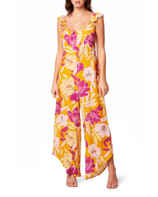 band of the free Euphoria Floral Jumpsuit in Gold/Fuchsia at