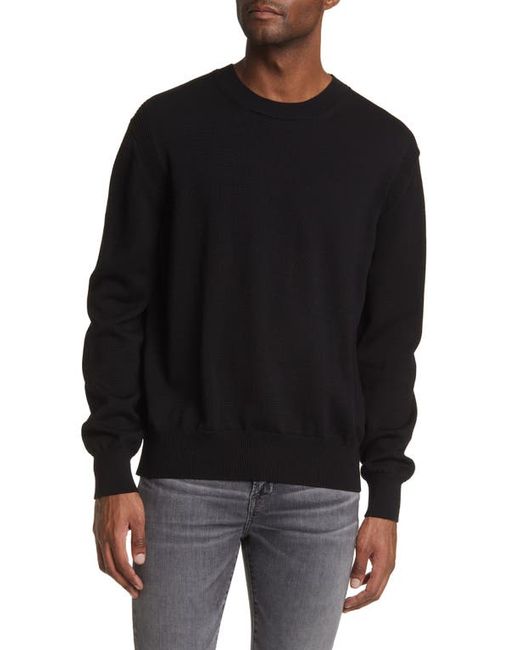 Frame Oversize Merino Wool Sweater in at
