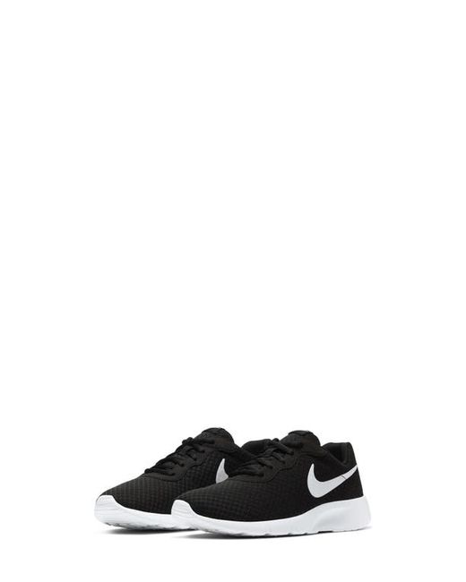 Nike Tanjun Sneaker in Black at