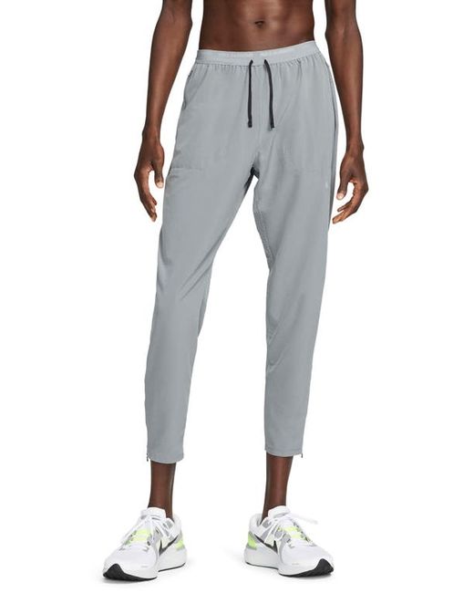 Nike Dri-FIT Phenom Woven Running Pants in Smoke Grey/Reflective at
