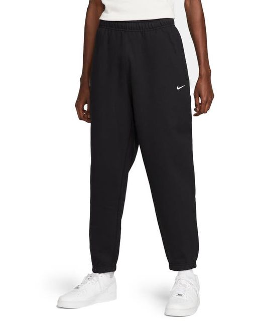 Nike Solo Swoosh Fleece Sweatpants in Black at