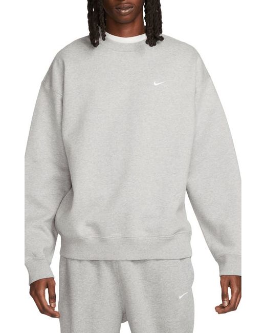 Nike Solo Swoosh Oversize Crewneck Sweatshirt in Dark Grey Heather/White at