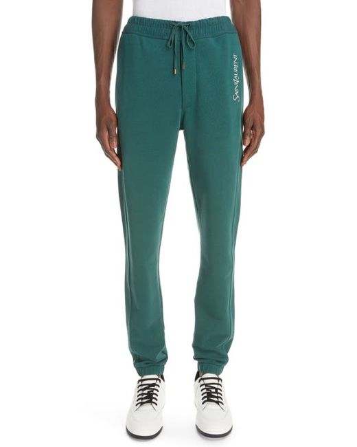 Saint Laurent Embroidered Logo Cotton Joggers in Vert/Naturel at