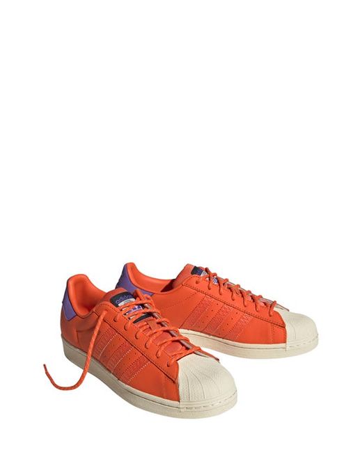 Adidas Superstar Sneaker in Orange/Orange at