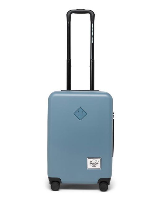 Herschel Supply Co. . Heritage Hardshell Carry-On Spinner in at