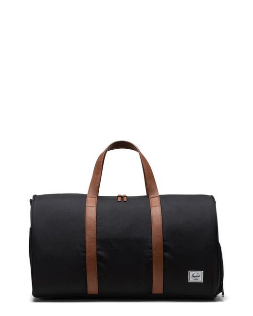 Herschel Supply Co. . Novel Recycled Nylon Duffle Bag in at