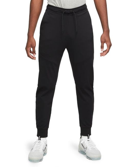 Nike Tech Essentials Joggers in at Small