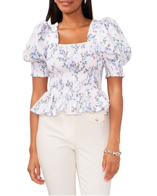 Chaus Puff Sleeve Smocked Peplum Top in White/Blue at Small