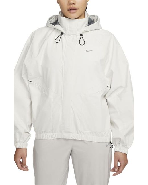 Nike Swift Storm-FIT Running Jacket in Pale Ivory/Black at X-Small
